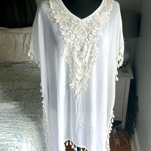 White, chiffon swimsuit coverup.  One size/fits many.  Gently used.